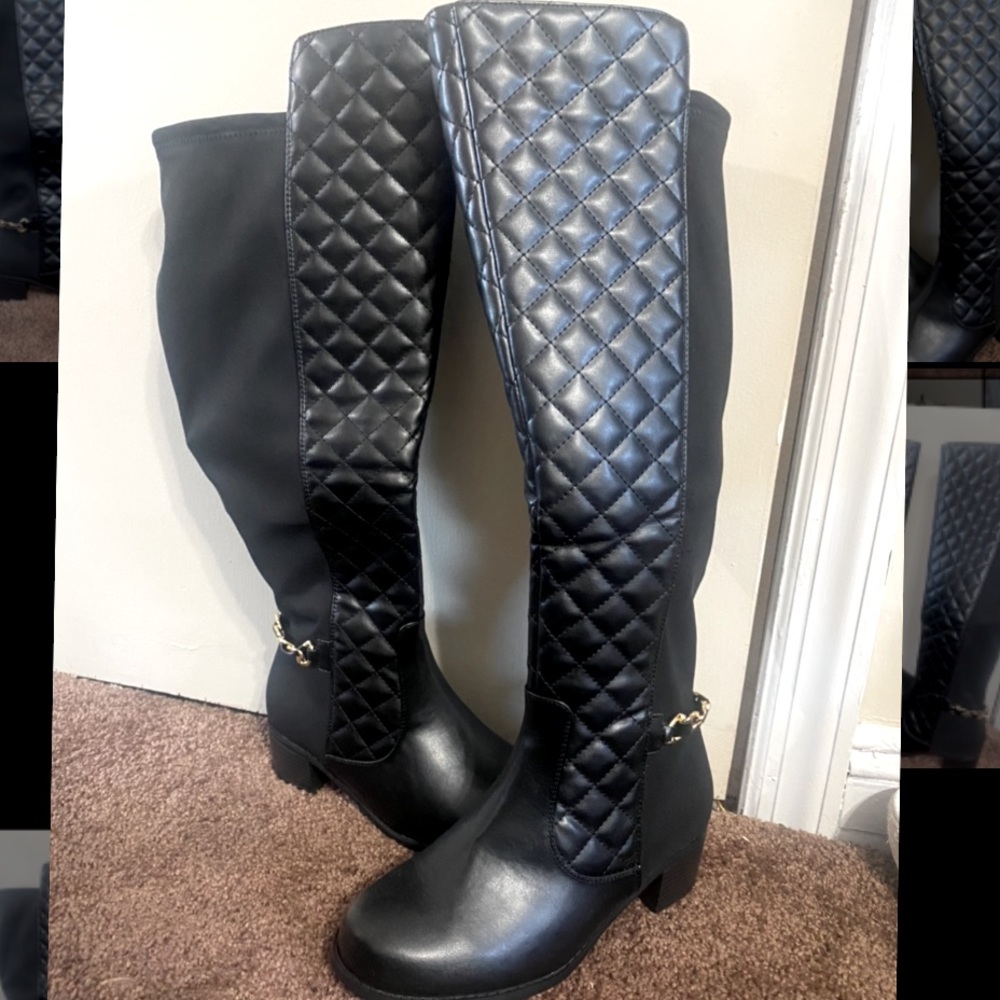 Never worn, over the knee black boots
